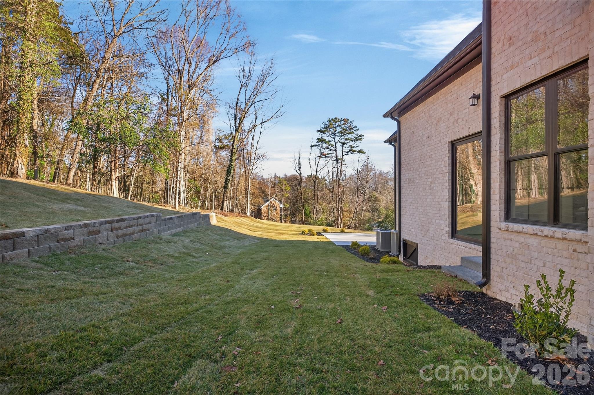 6811 Burlwood Road Charlotte, NC 28211 - Photo 42 of 43 a view of a house with a yard