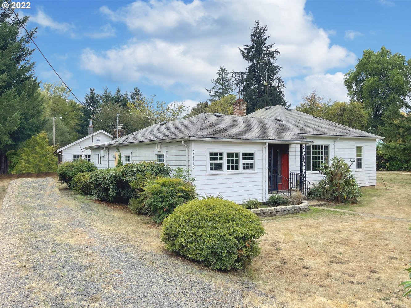 92115 Marcola Road Marcola, OR 97454 - Photo 1 of 28 a front view of a house with garden