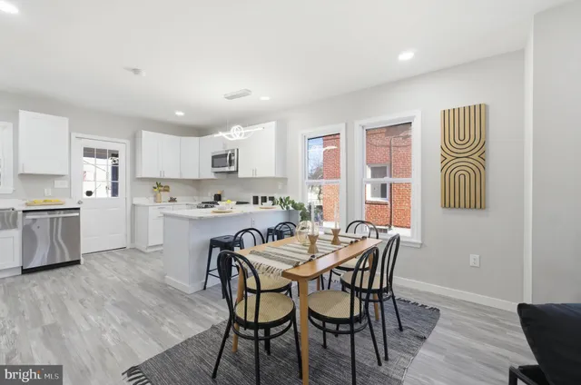 a view of a livingroom and dining room