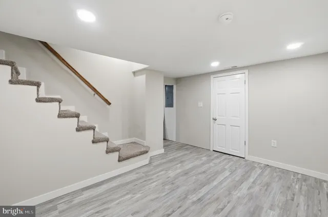 a bathroom with a bathtub and a toilet
