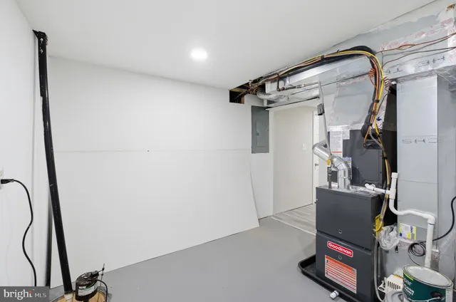 aerial view of a house with outdoor space and swimming pool