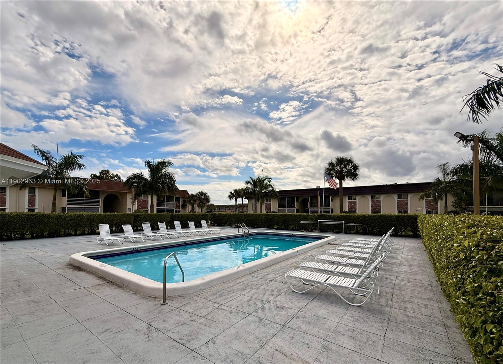 22805 Southwest 66th Avenue, Unit 208 Boca Raton, FL 33428 - Photo 20 of 22 a park view with a bench