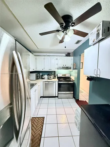 a view of backyard with green space