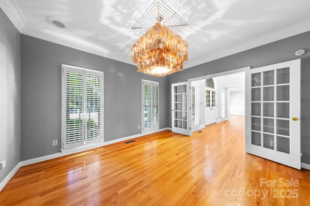 a view of an empty room with a window and outer view