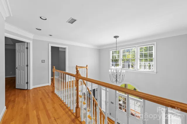 a view of an entryway with wooden floor