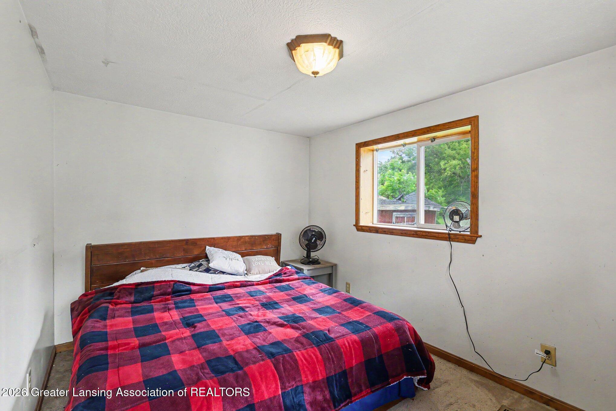 5645 Rossman Road Onondaga, MI 49264 - Photo 4 of 32 Primary Bedroom