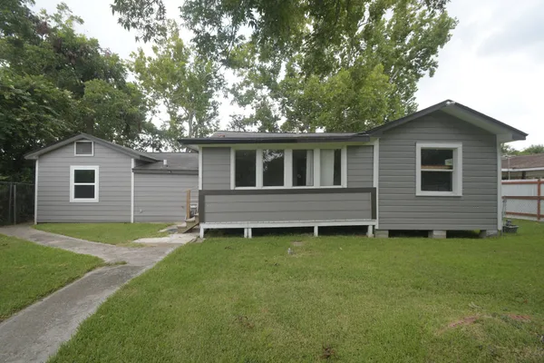 a view of a backyard with a garden