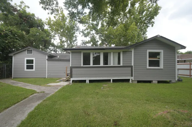 a view of a backyard with a garden