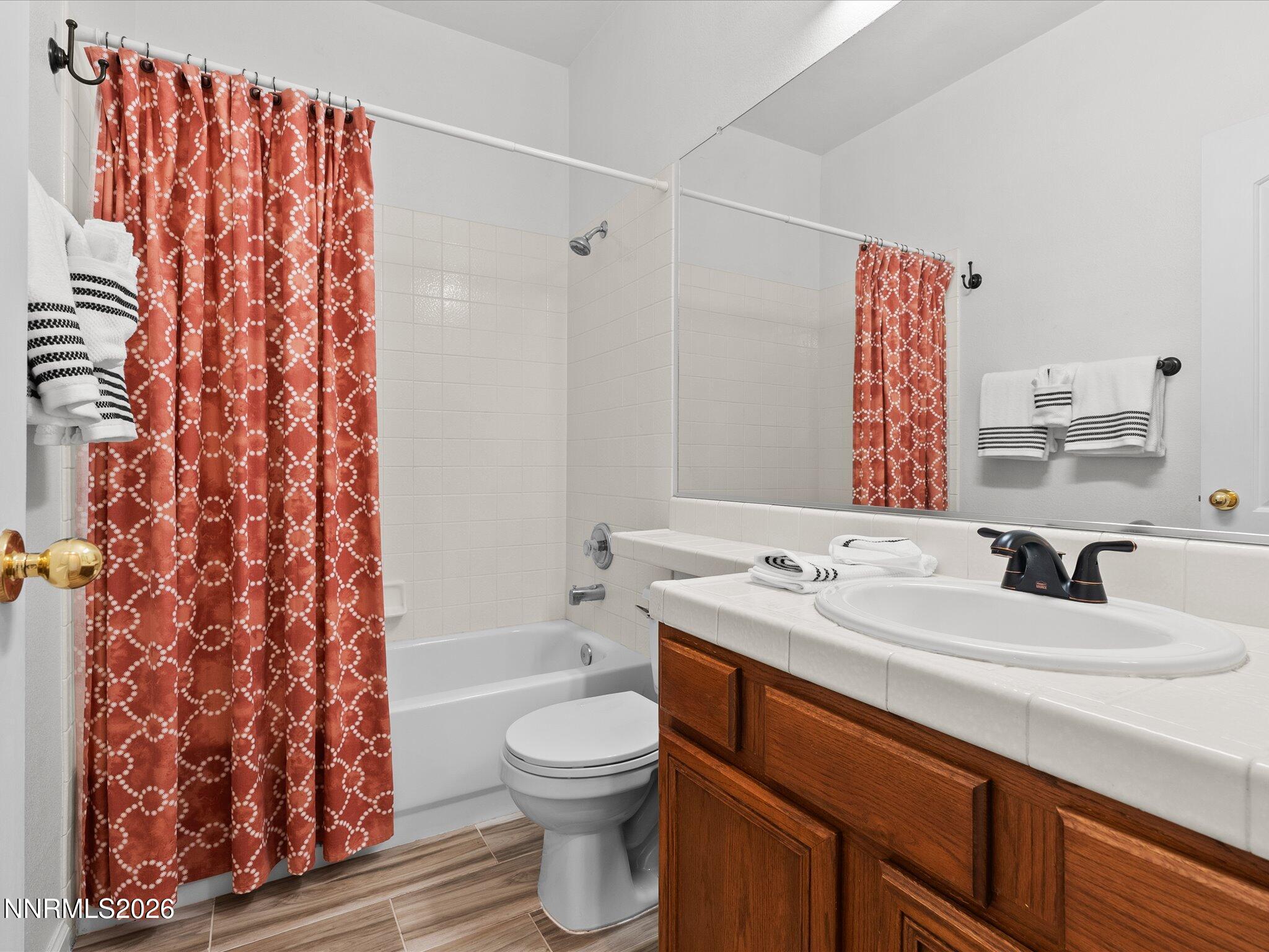 3101 Green River Drive Reno, NV 89503 - Photo 34 of 62 a bathroom with a sink toilet and shower
