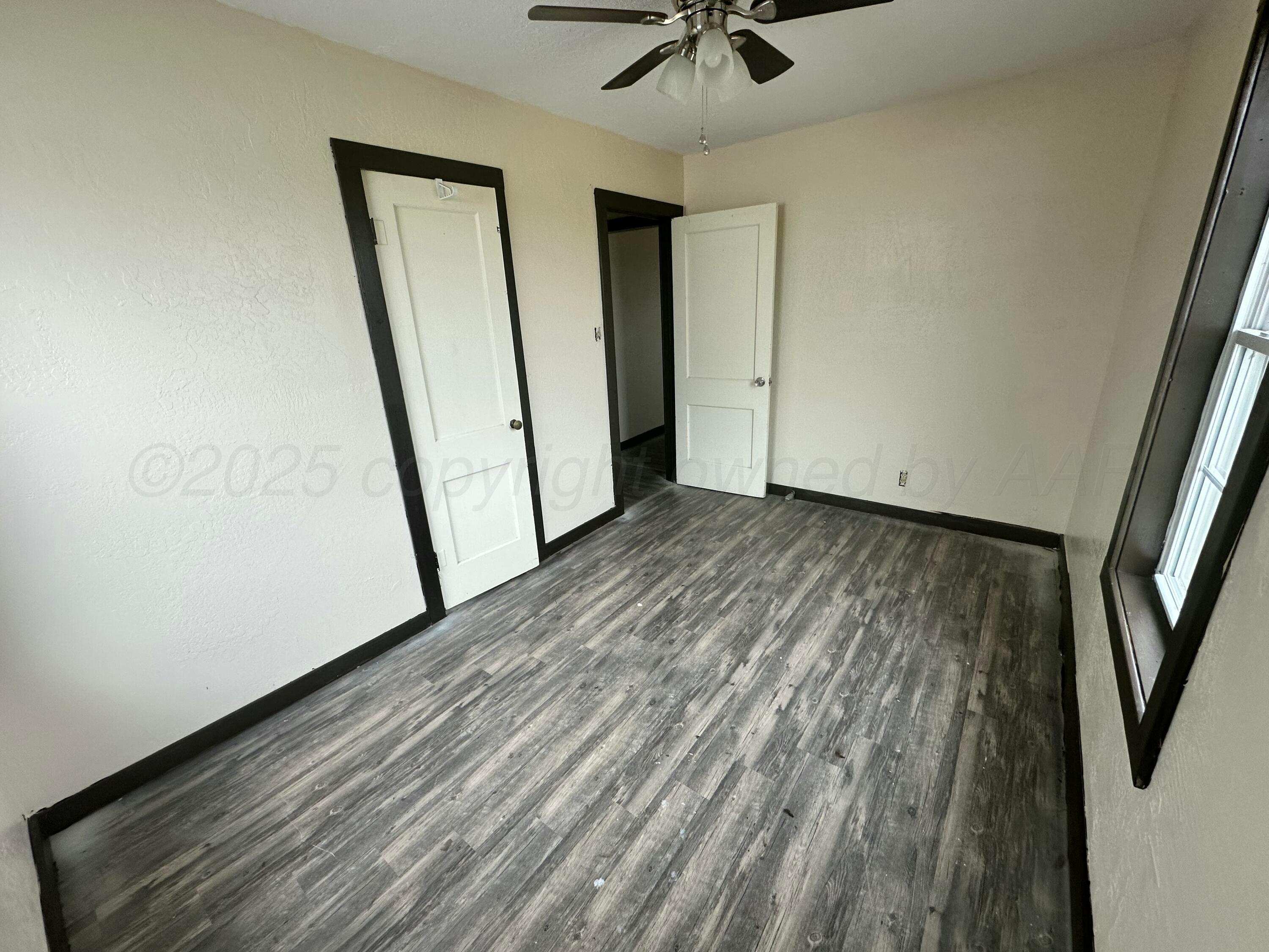 709 Flora Avenue Panhandle, TX 79068 - Photo 15 of 19 a view of a hallway