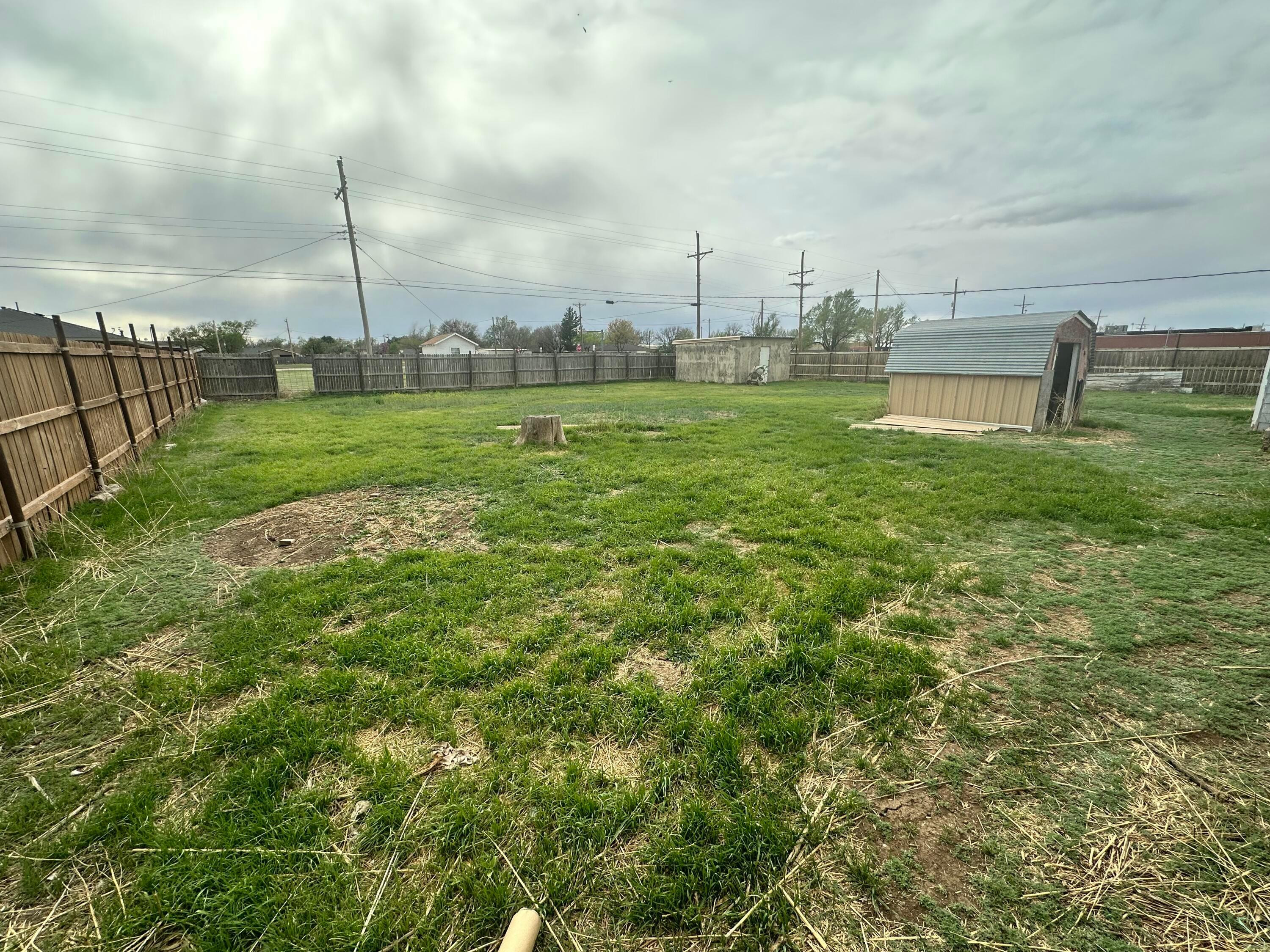 709 Flora Avenue Panhandle, TX 79068 - Photo 19 of 19 a view of a golf course with a lake