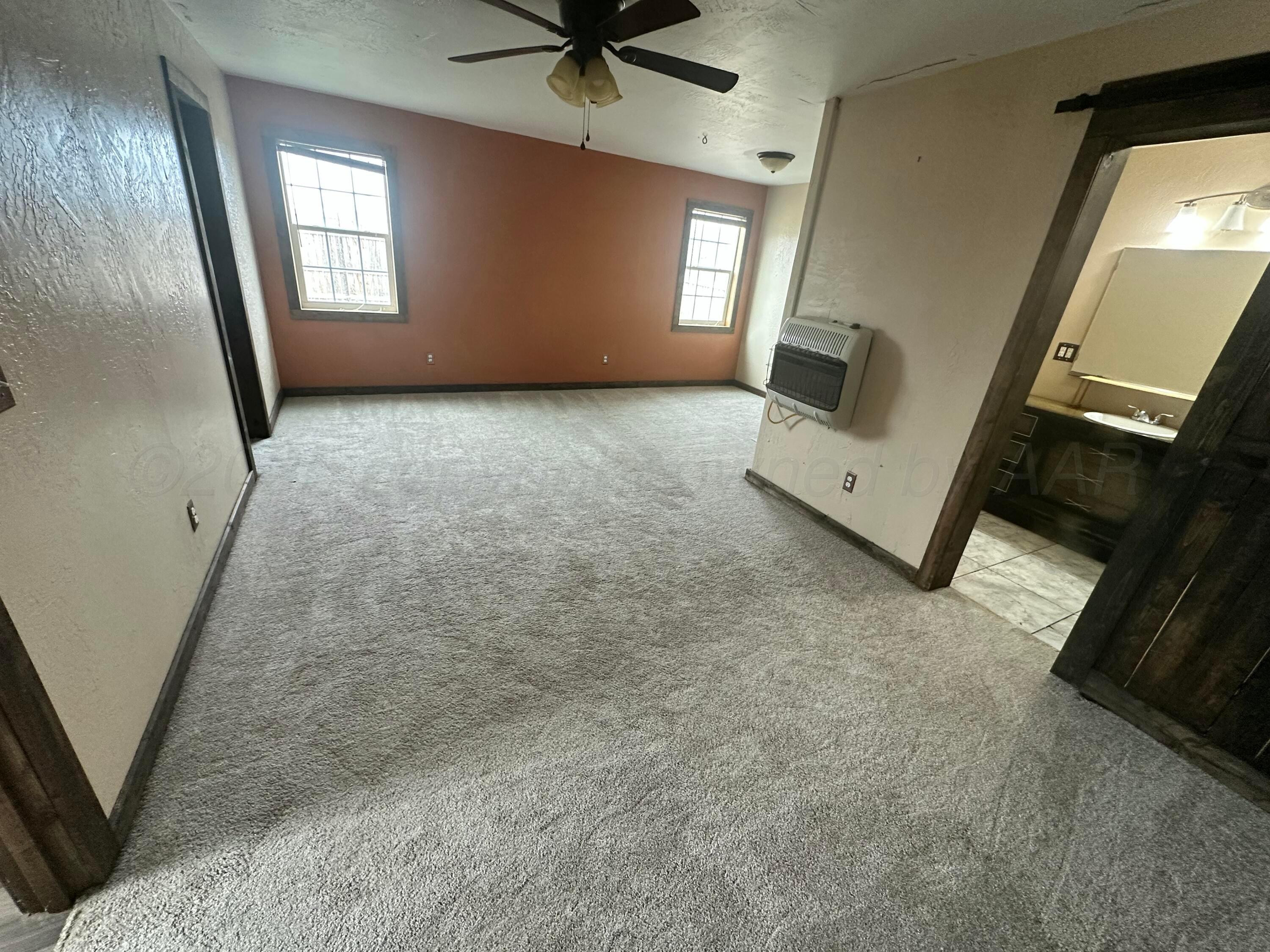 709 Flora Avenue Panhandle, TX 79068 - Photo 6 of 19 a view of a livingroom with a fireplace