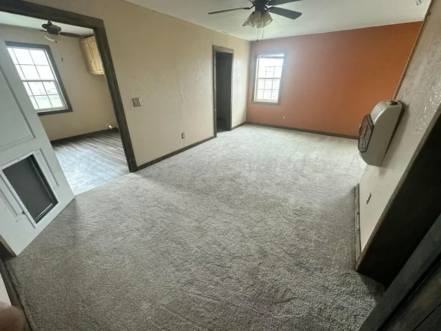 a view of a livingroom with a fireplace