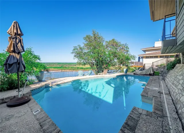 a view of a yard with furniture