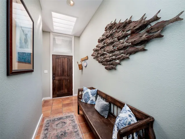 a bed room with a bed and a window