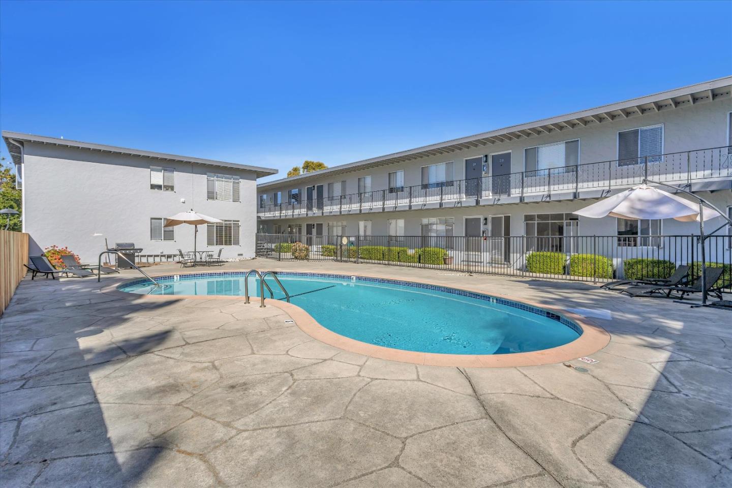 245 Bush Street Mountain View, CA 94041 - Photo 25 of 33 a view of a building with a swimming pool