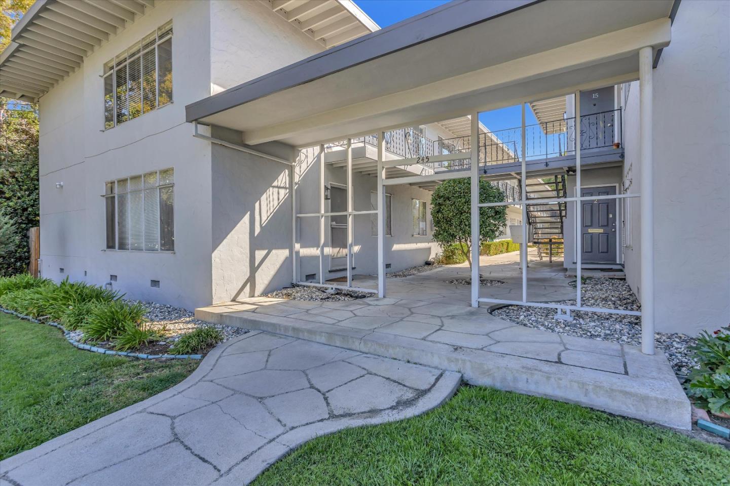 245 Bush Street Mountain View, CA 94041 - Photo 5 of 33 a view of a chair and table in backyard of the house