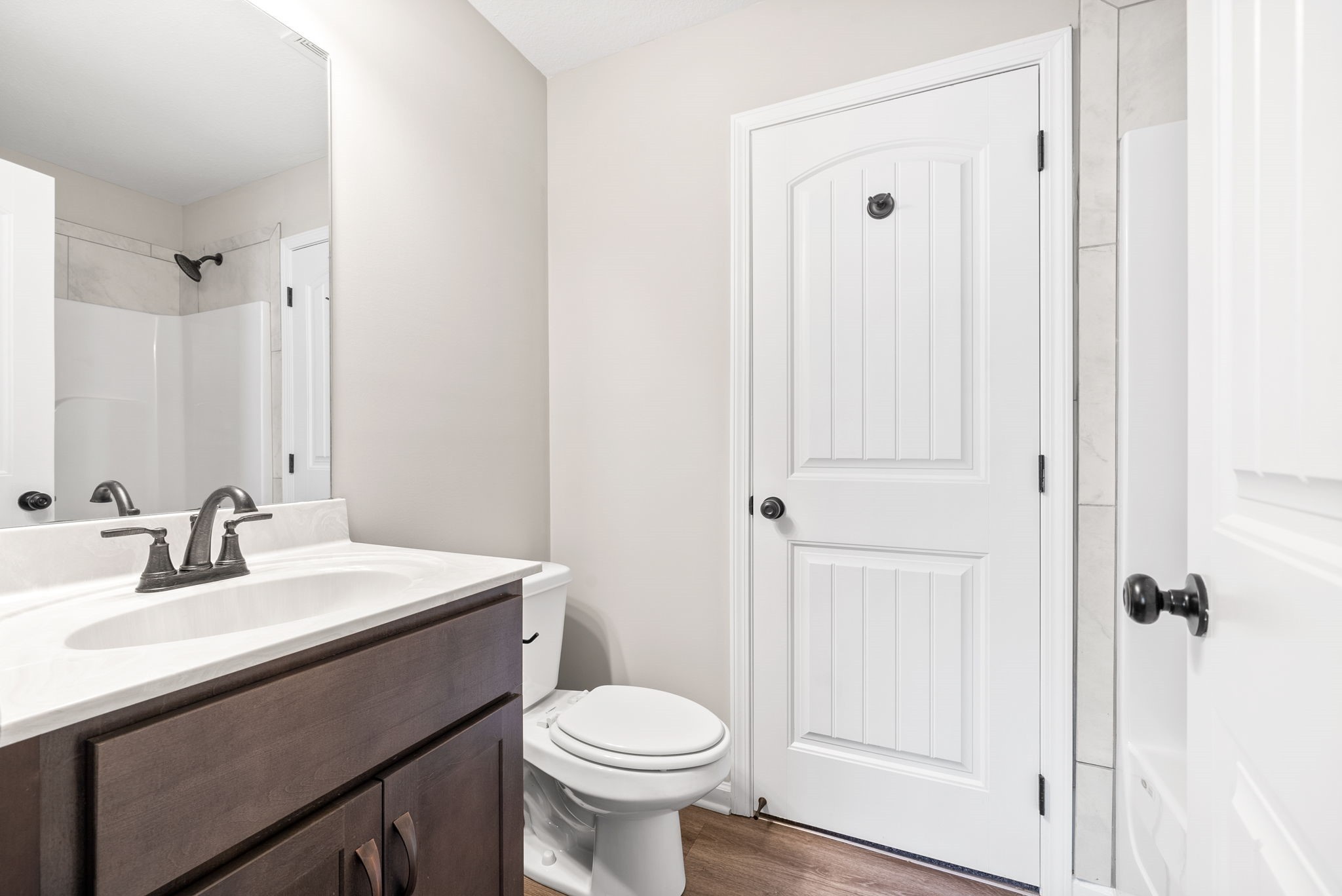 264 Smithson Lane, Unit B Clarksville, TN 37040 - Photo 17 of 25 a bathroom with a sink toilet and shower