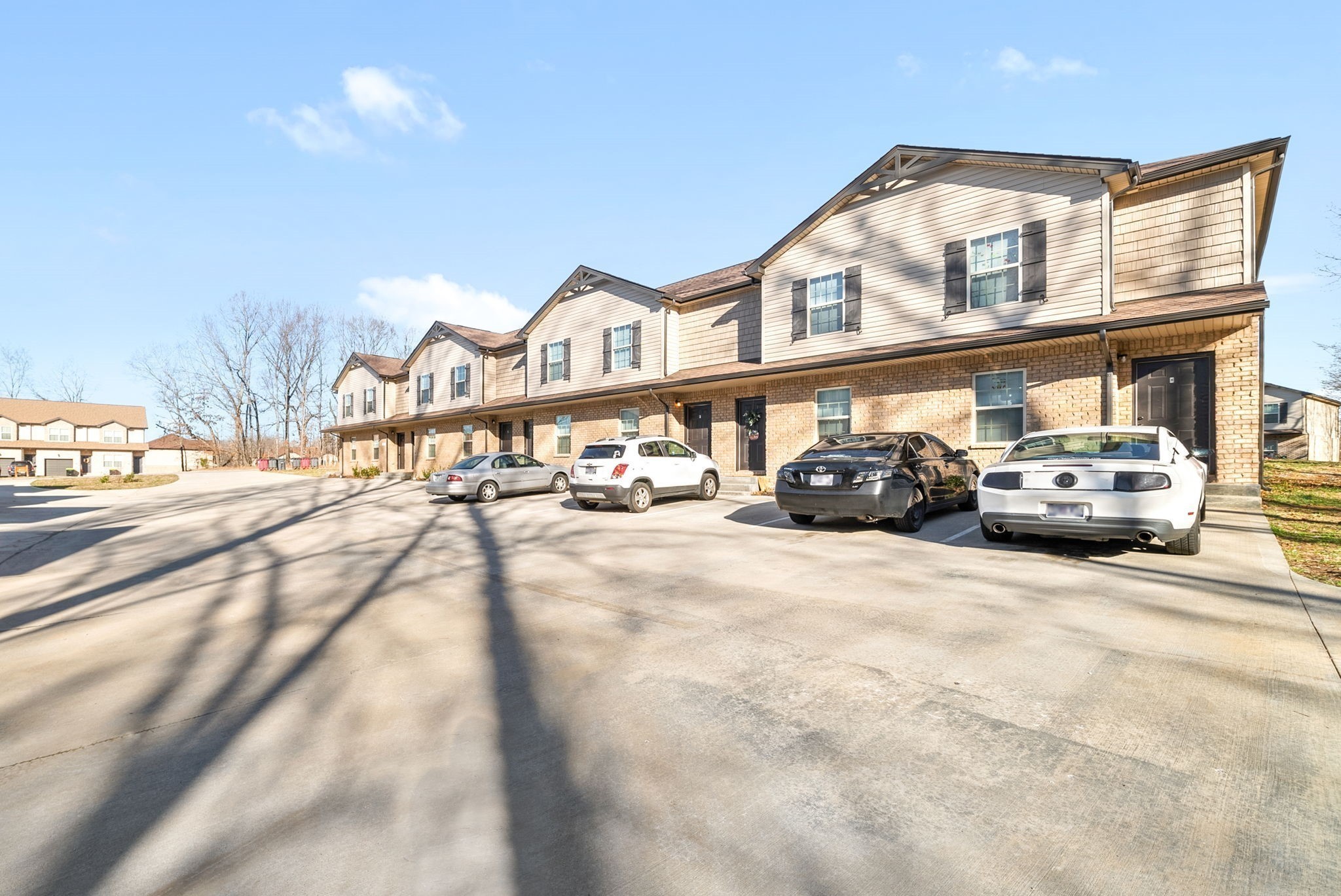 264 Smithson Lane, Unit B Clarksville, TN 37040 - Photo 3 of 25 a view of a car parked in front of a building