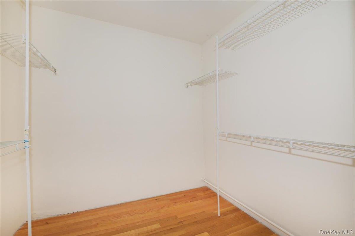 9 Cabot Road West Massapequa, NY 11758 - Photo 24 of 41 a view of a room with wooden floor