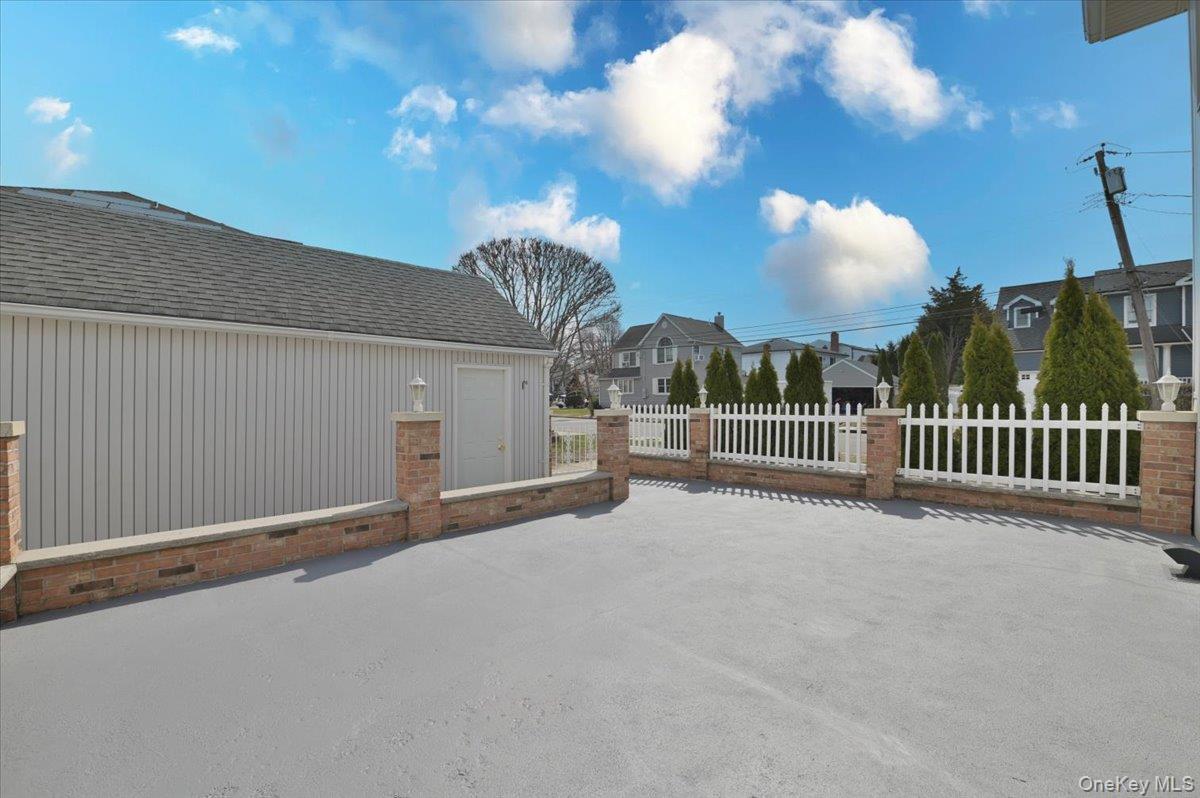 9 Cabot Road West Massapequa, NY 11758 - Photo 30 of 41 a view of a house with a porch