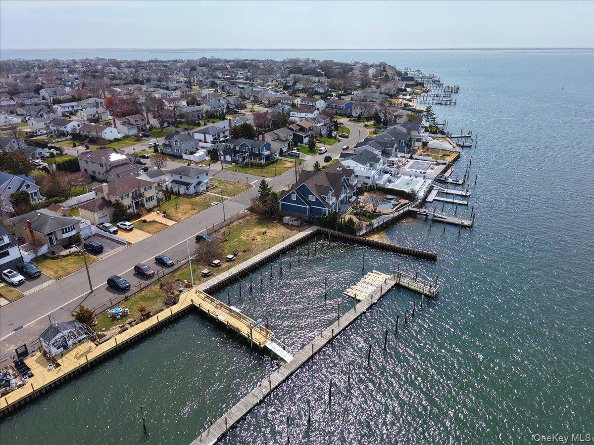9 Cabot Road West Massapequa, NY 11758 - Photo 31 of 41 an aerial view of residential houses with outdoor space