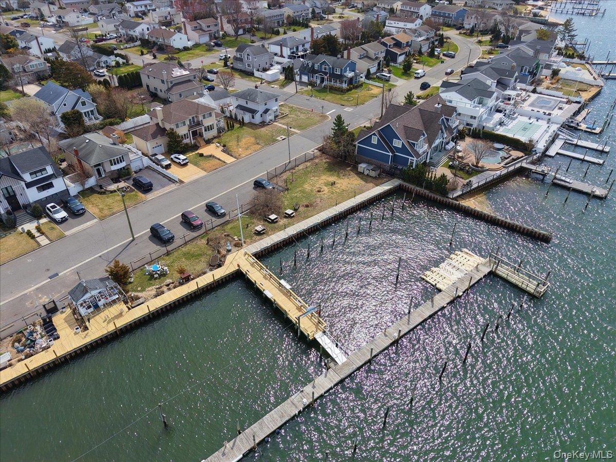 9 Cabot Road West Massapequa, NY 11758 - Photo 33 of 41 an aerial view of residential houses with outdoor space