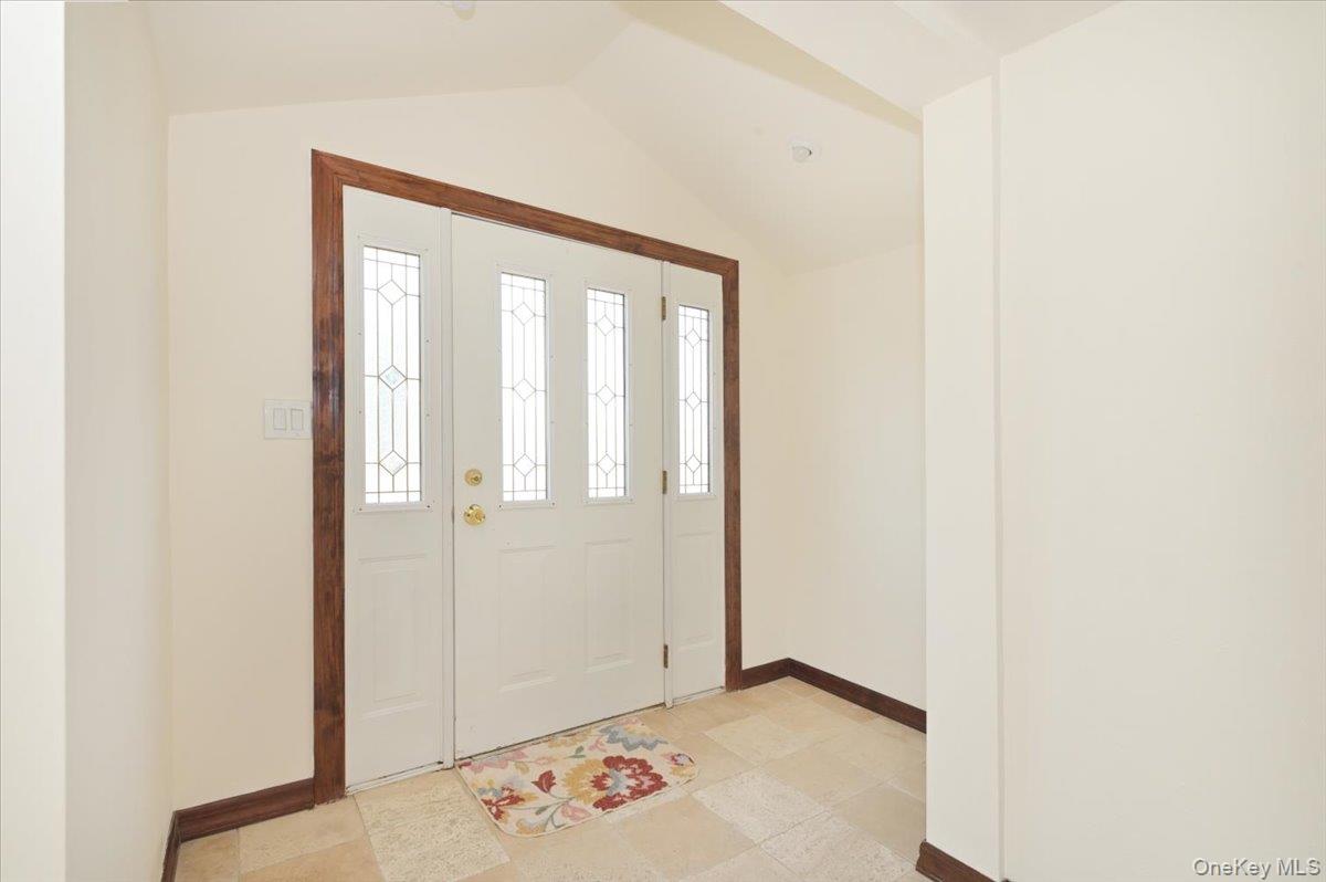 9 Cabot Road West Massapequa, NY 11758 - Photo 8 of 41 a view of a room with rack on the wall