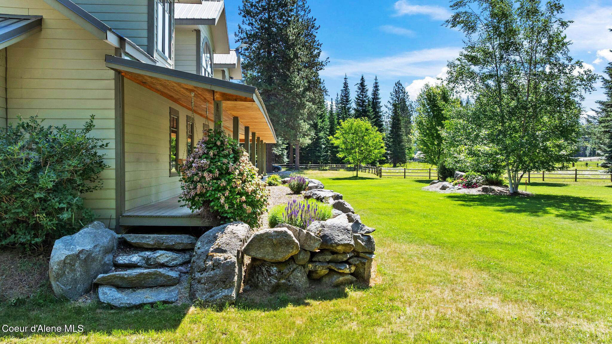 4719 Selle Road Sandpoint, ID 83864 - Photo 14 of 93 Rock accented flower beds