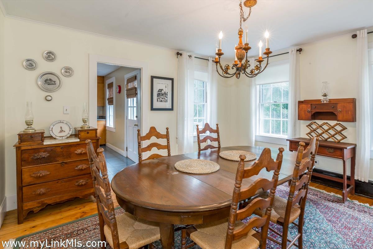 986 State Road Vineyard Haven, MA 02568 - Photo 13 of 27 a view of a dining room with furniture