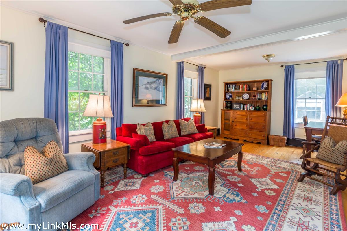986 State Road Vineyard Haven, MA 02568 - Photo 15 of 27 a living room with furniture and a window