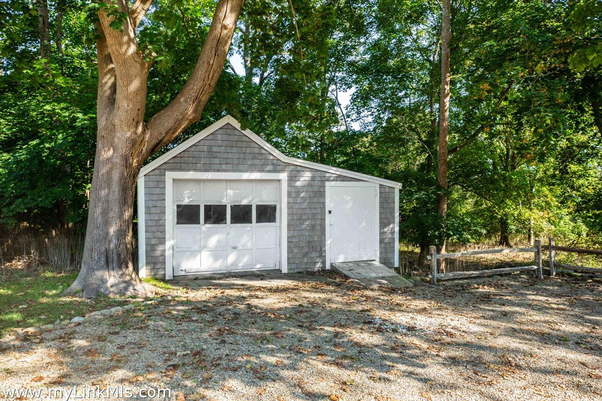 986 State Road Vineyard Haven, MA 02568 - Photo 25 of 27 a front view of a house with a yard