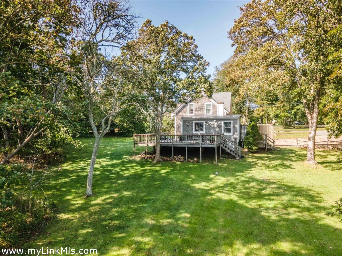 986 State Road Vineyard Haven, MA 02568 - Photo 4 of 27 a view of house with a big yard