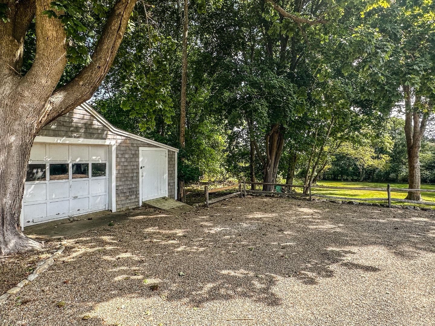 986 State Road Vineyard Haven, MA 02568 - Photo 6 of 27 a view of a house with a yard
