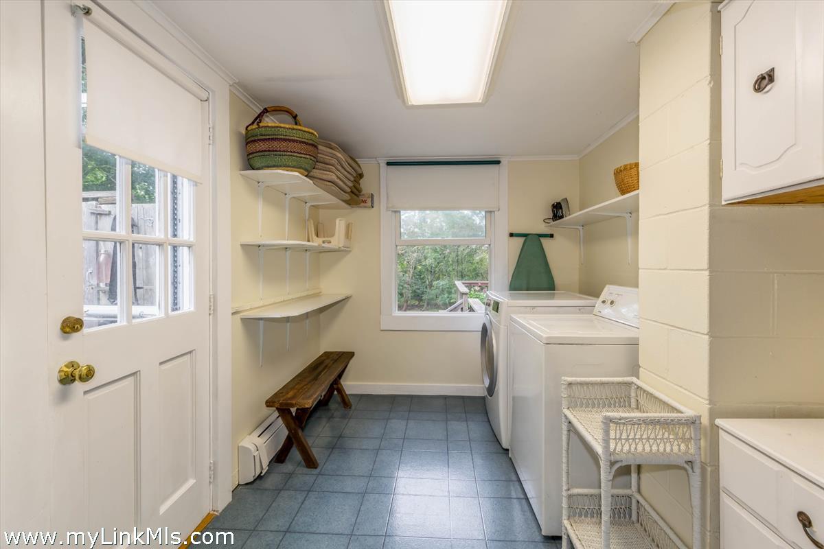 986 State Road Vineyard Haven, MA 02568 - Photo 10 of 27 a room with a washer and dryer