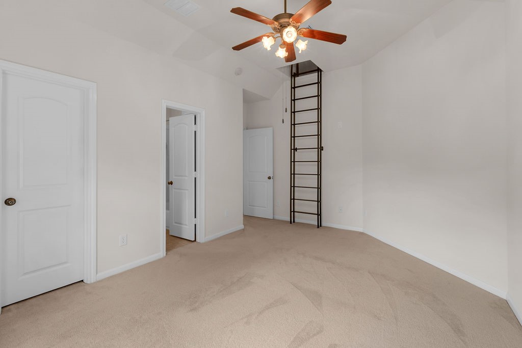 7306 Starflower Katy, TX 77494 - Photo 43 of 50 an empty room with windows and fan
