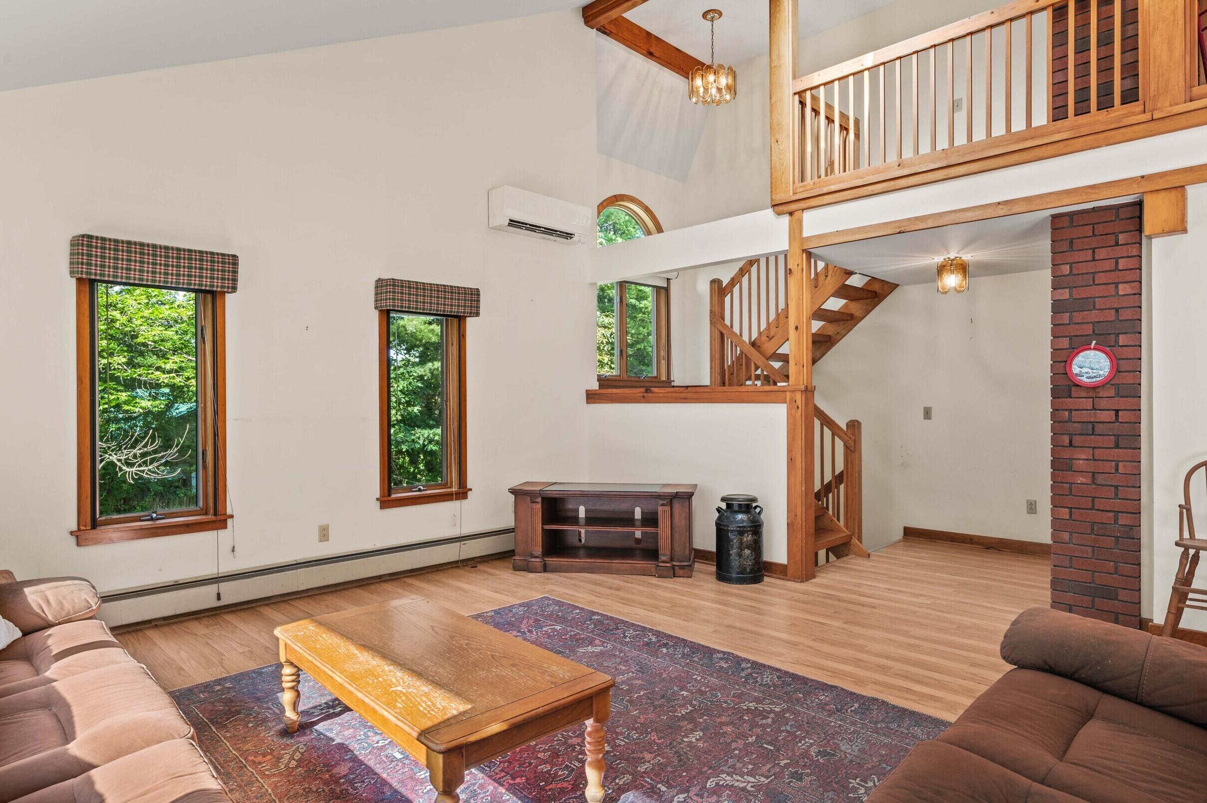 196 Case Road Winthrop, ME 04364 - Photo 20 of 65 Living room to stairwell