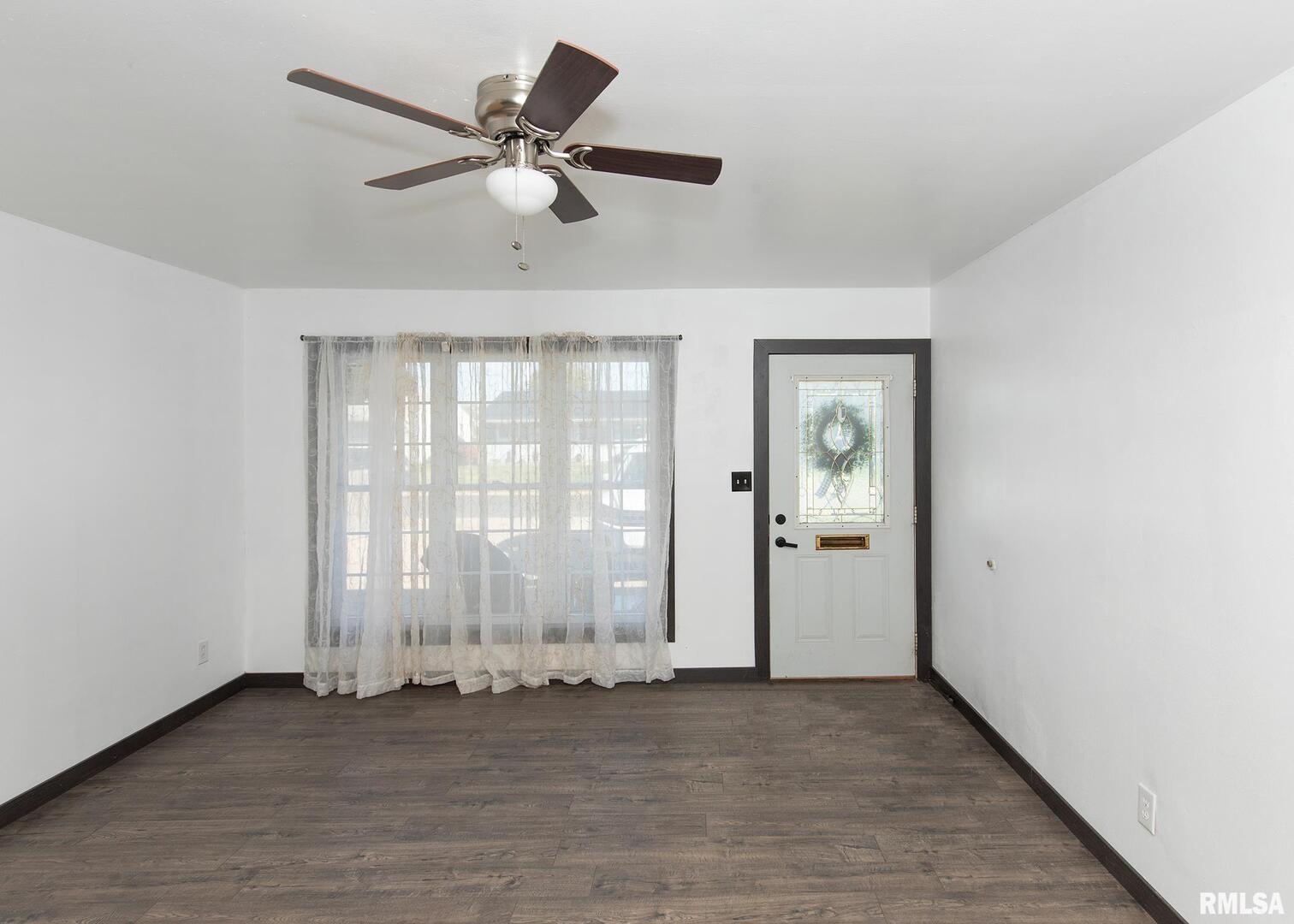 444 6th Street East Milan, IL 61264 - Photo 4 of 26 a view of an empty room with a window