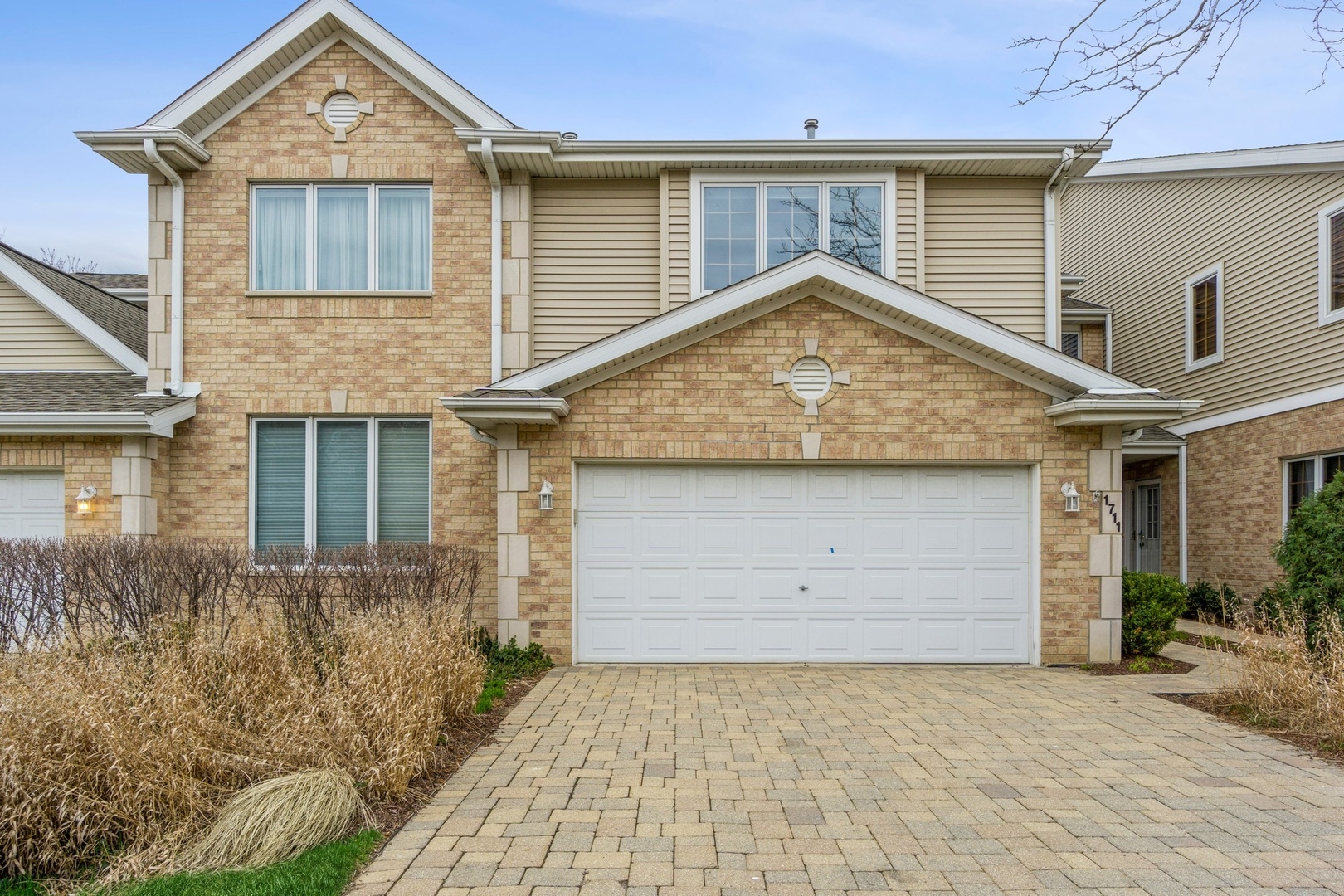 1711 Park Ridge Point Park Ridge, IL 60068 - Photo 1 of 16 front view of a house with a yard