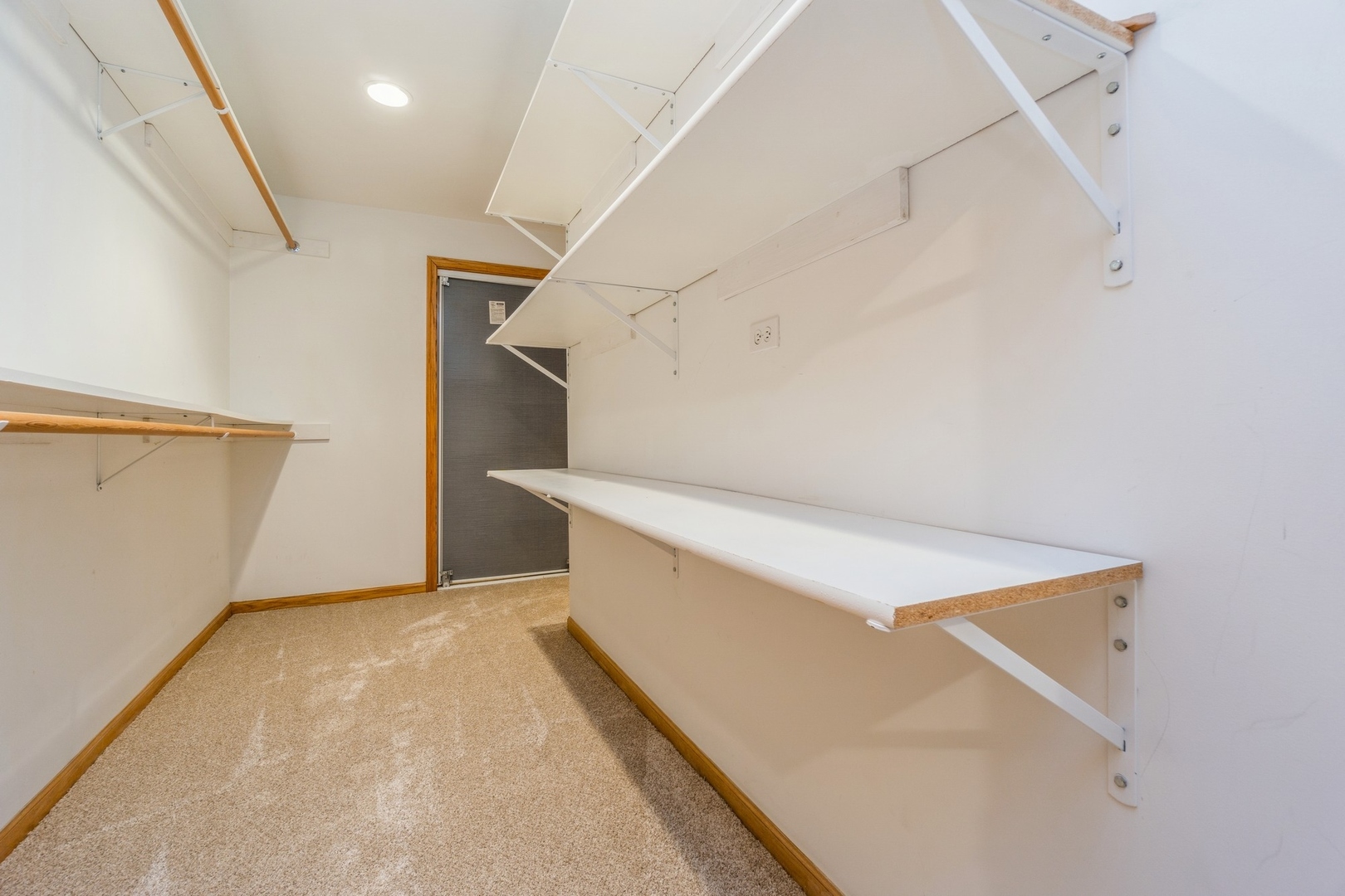 1711 Park Ridge Point Park Ridge, IL 60068 - Photo 15 of 16 an empty room with wooden floor and white walls