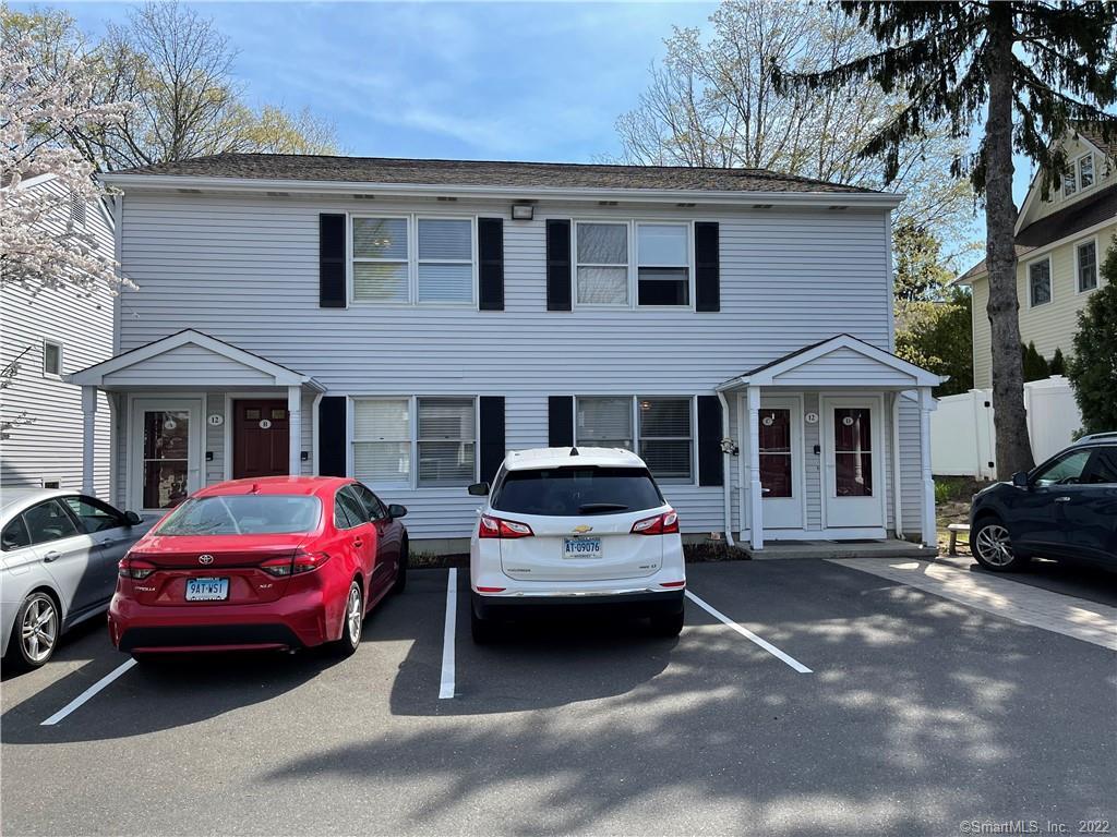 12 D Grove Street Ridgefield, CT 06877 - Photo 1 of 1 a car parked in front of a house
