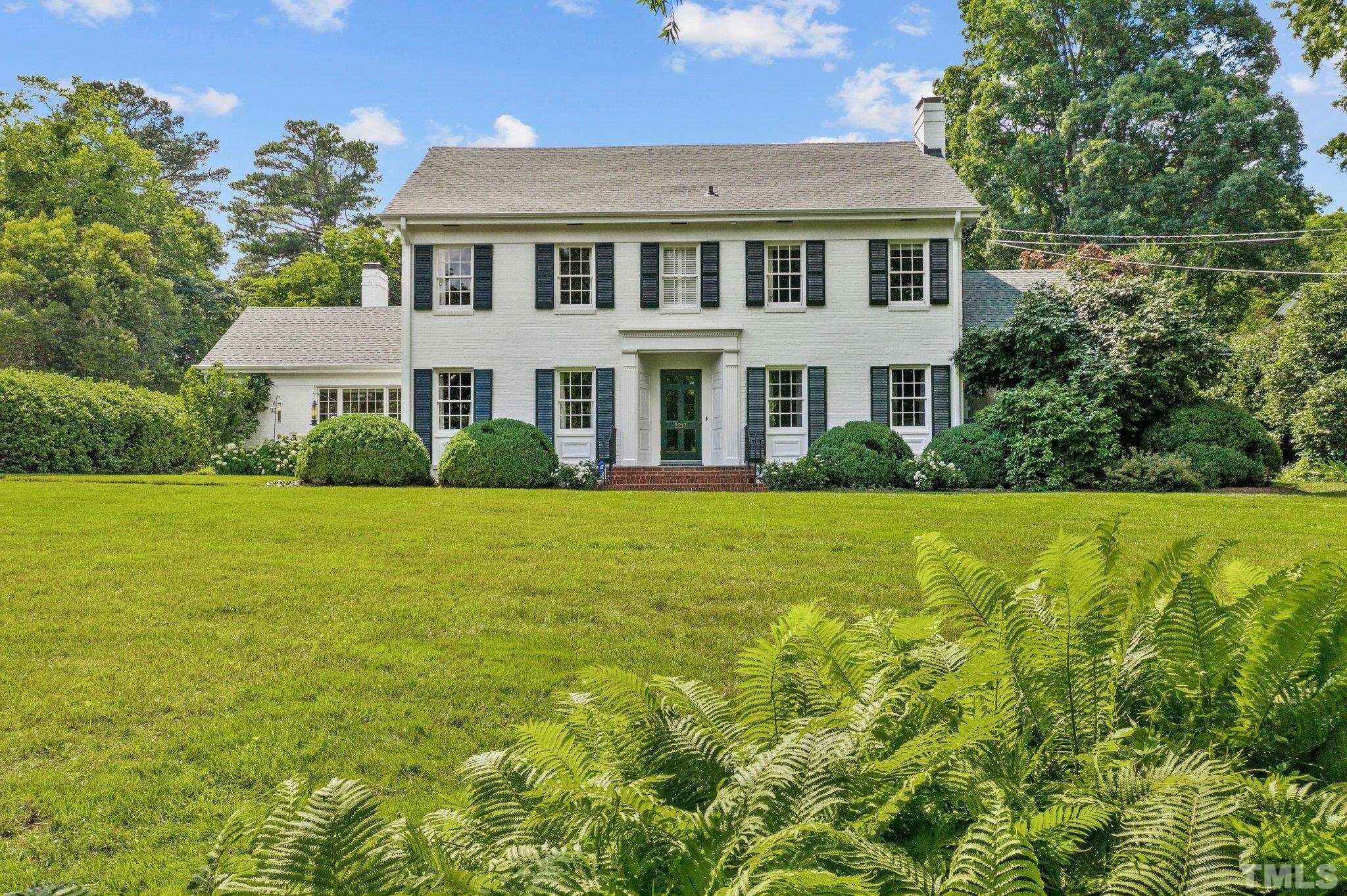 2217 St Marys Street Raleigh, NC 27608 - Photo 1 of 52 a front view of a house with garden