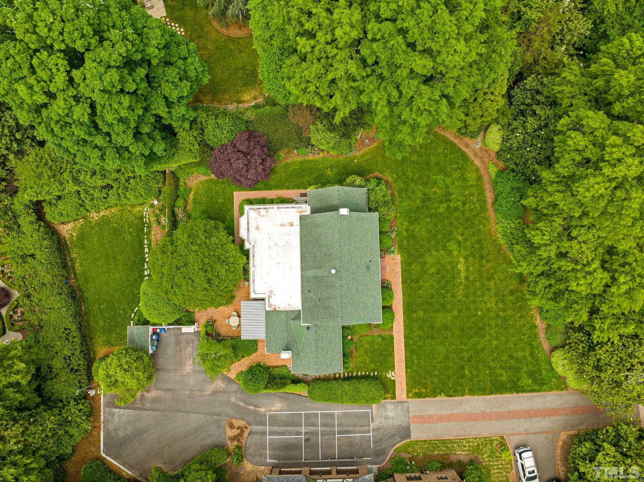2217 St Marys Street Raleigh, NC 27608 - Photo 44 of 52 an aerial view of a house with a yard