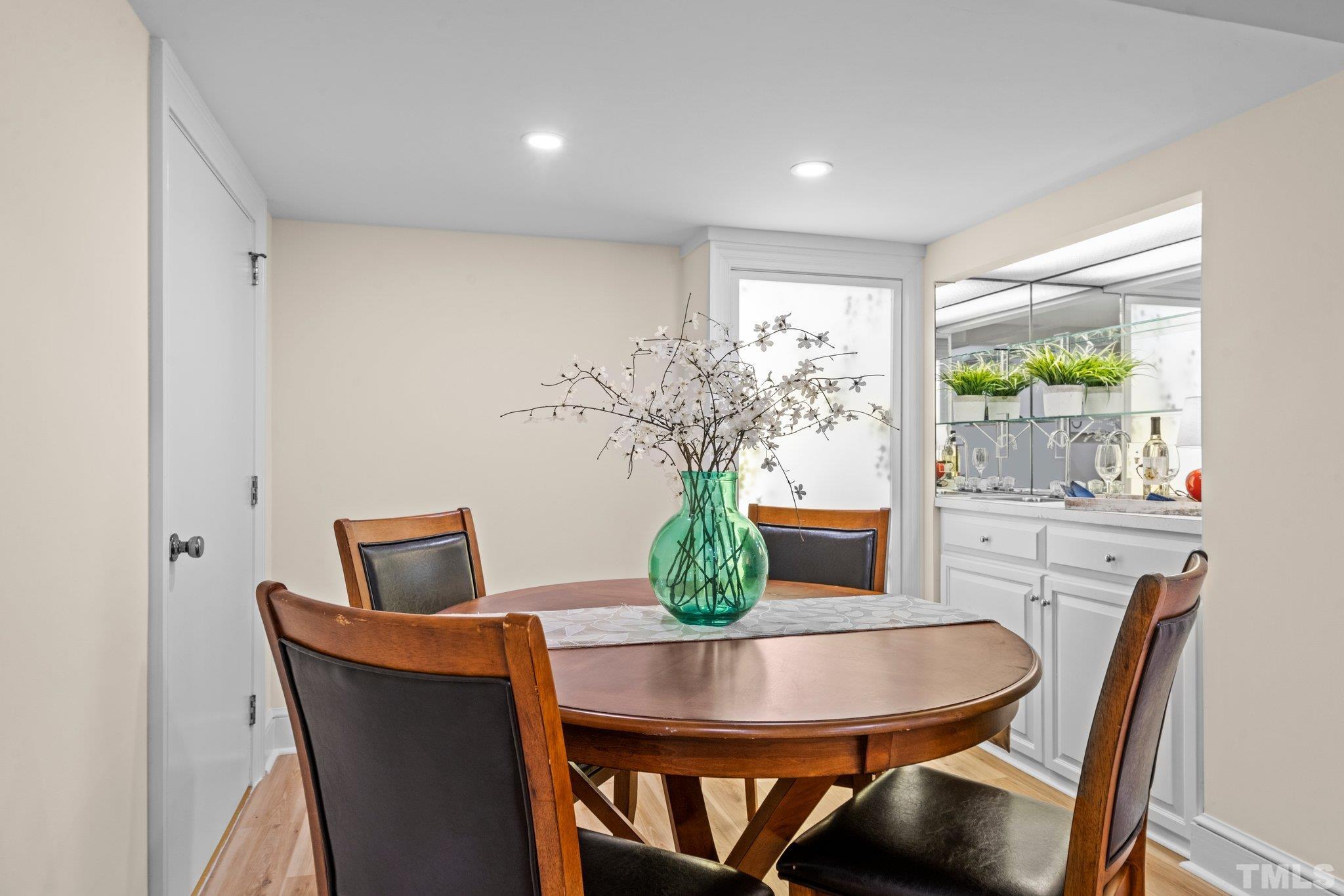 2217 St Marys Street Raleigh, NC 27608 - Photo 47 of 52 a view of a dining room with furniture window and outside view