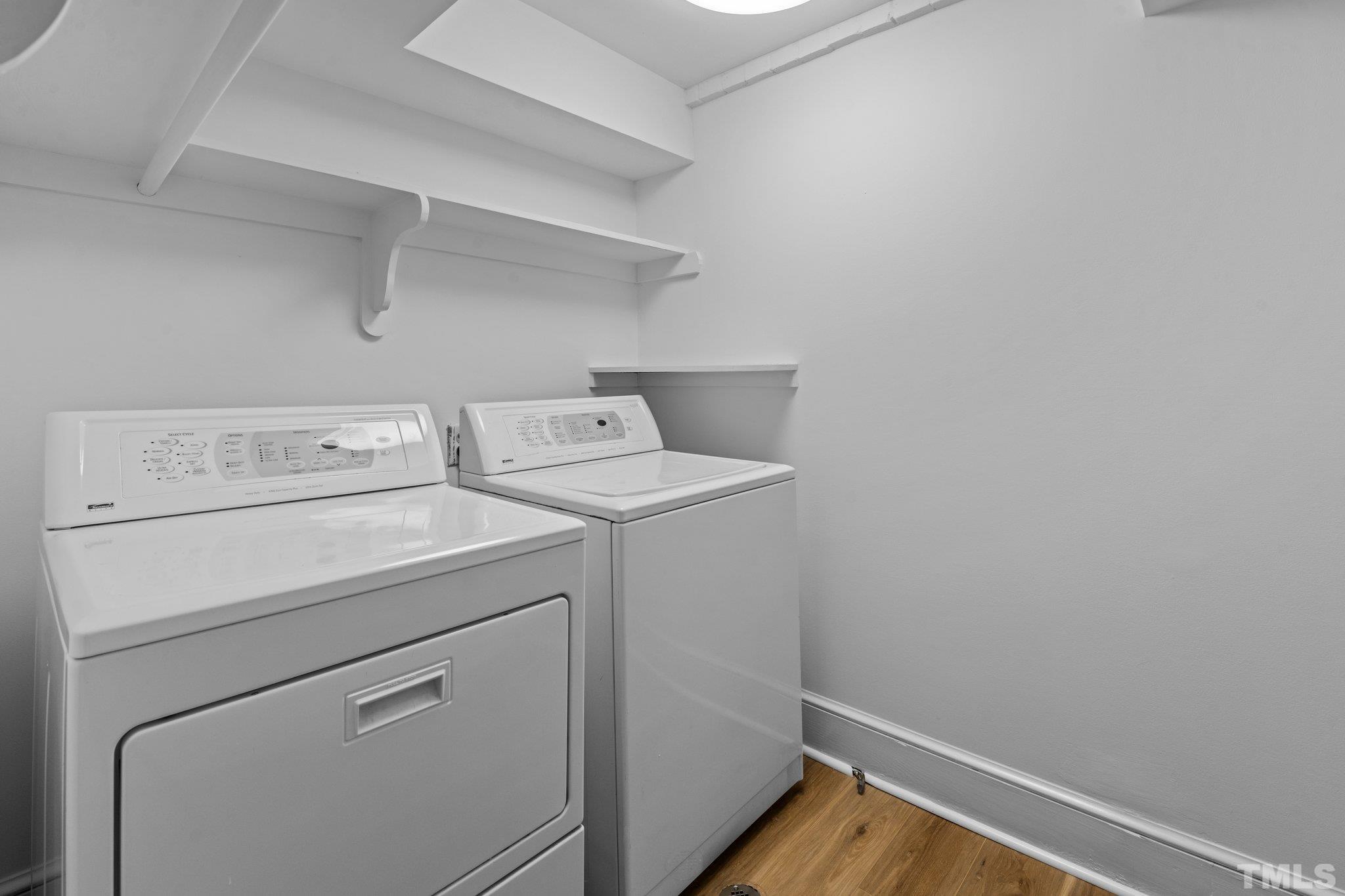 2217 St Marys Street Raleigh, NC 27608 - Photo 50 of 52 a utility room with dryer and washer