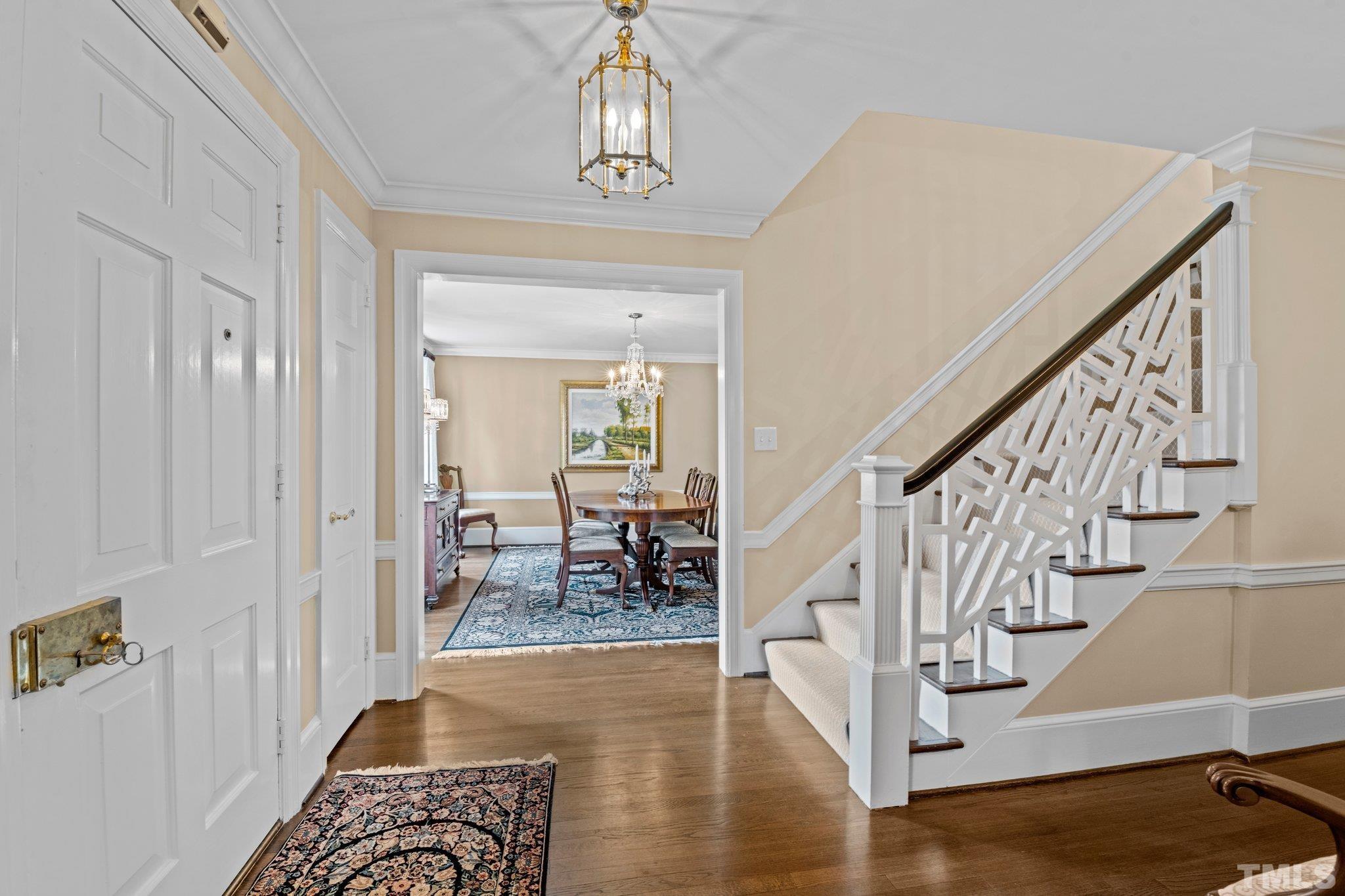 2217 St Marys Street Raleigh, NC 27608 - Photo 7 of 52 a view of entryway and hall with wooden floor