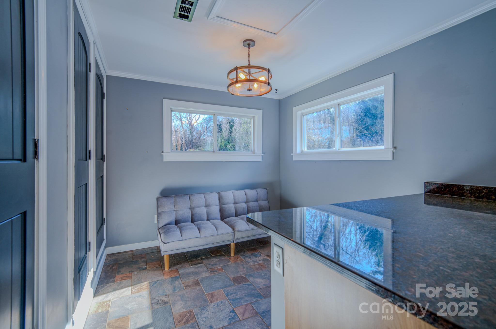 206 Martin Road Swannanoa, NC 28778 - Photo 16 of 42 a living room with furniture and a window