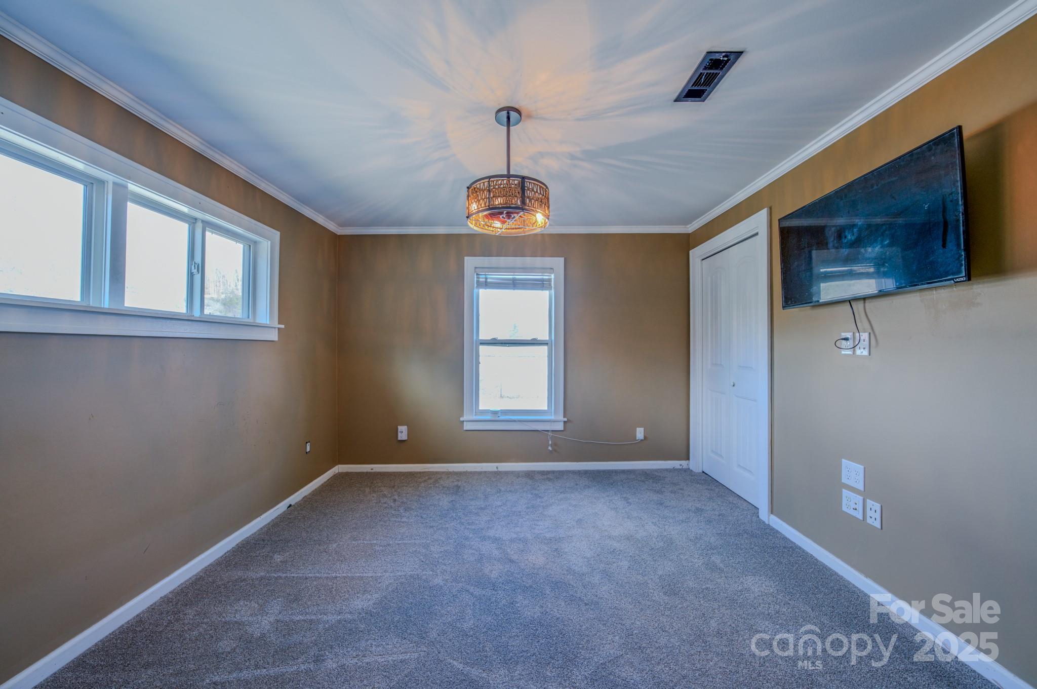 206 Martin Road Swannanoa, NC 28778 - Photo 17 of 42 a view of an empty room with a window
