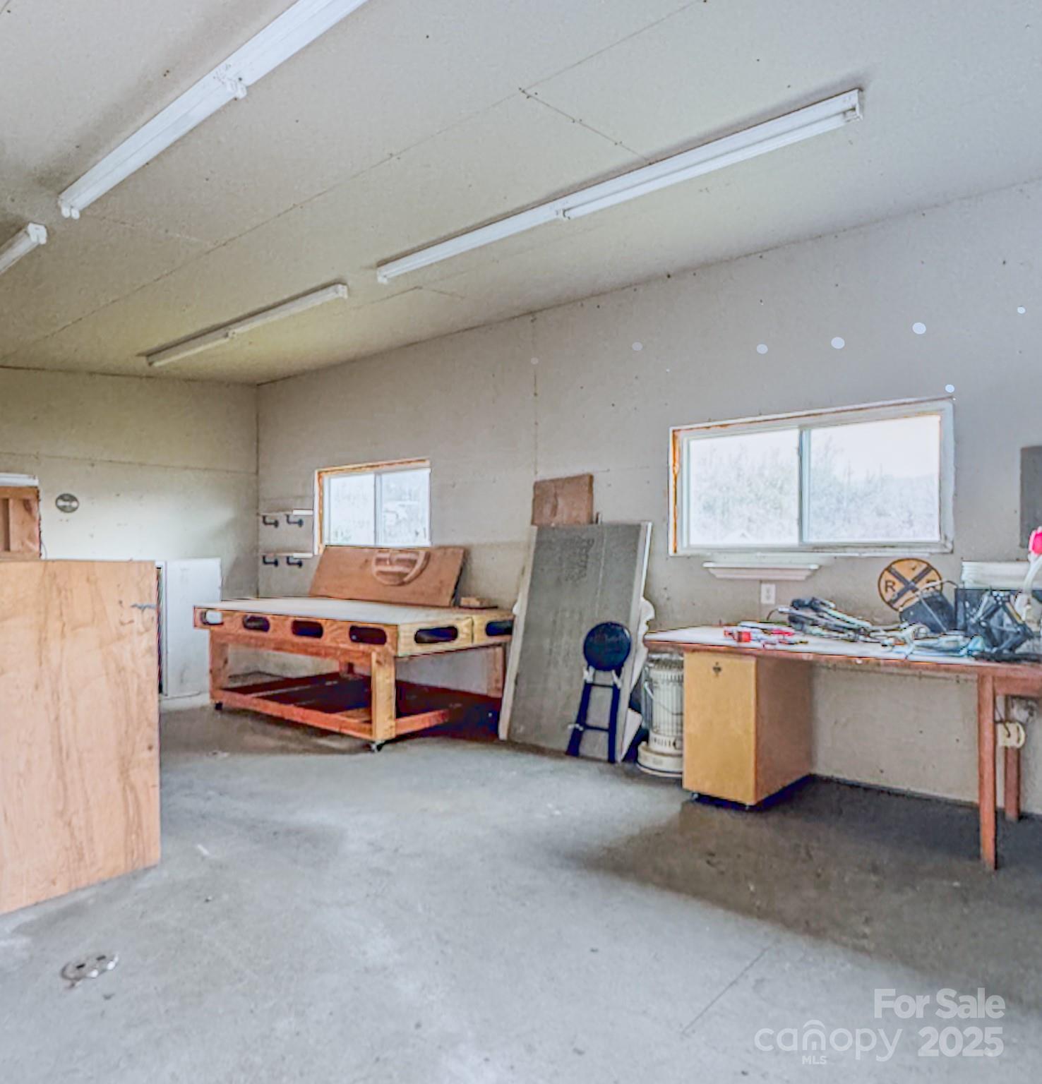 206 Martin Road Swannanoa, NC 28778 - Photo 41 of 42 a bedroom with furniture and a bed