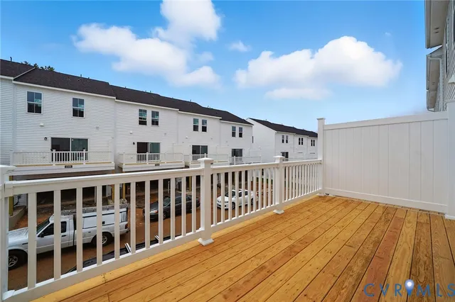 a car parked in front of a white building